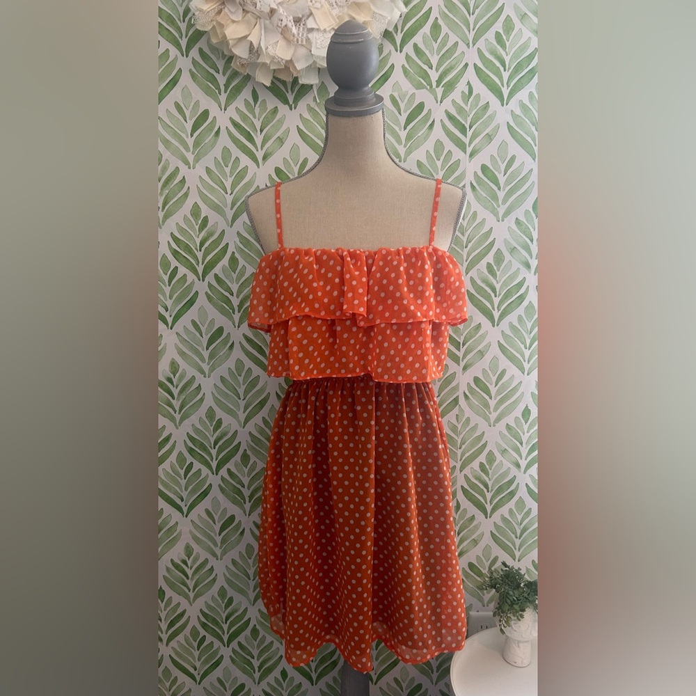 Women’s orange polka dot dress
